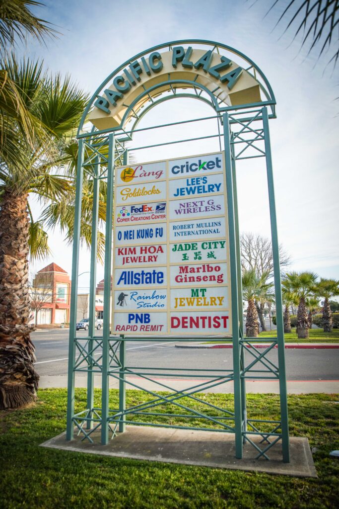 advertisements on a pacific plaza billboard
