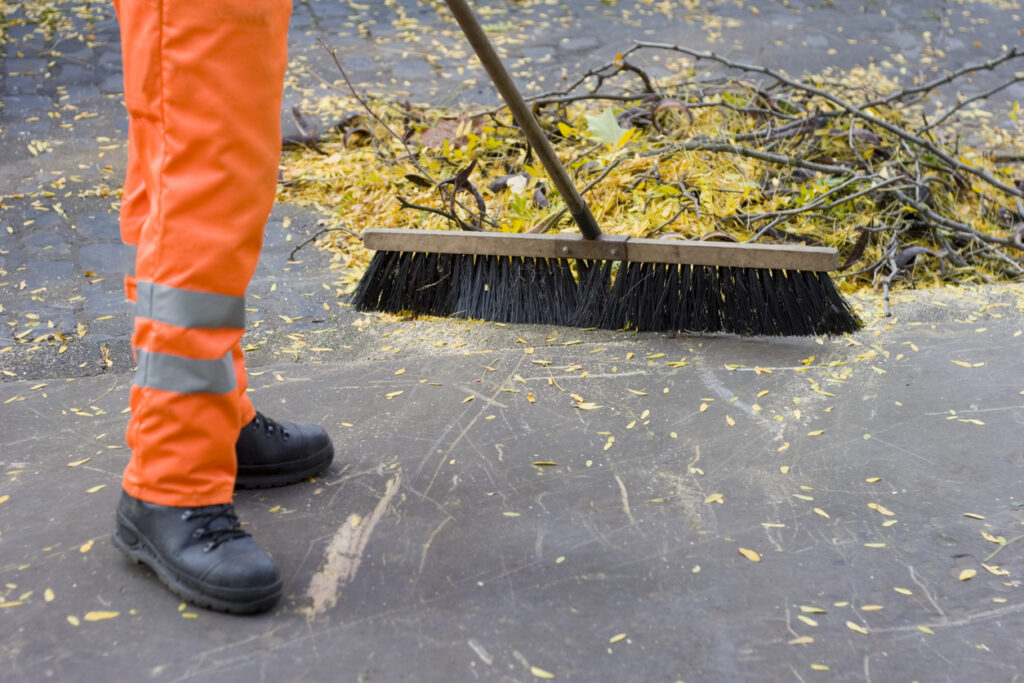 Cleaning the street.